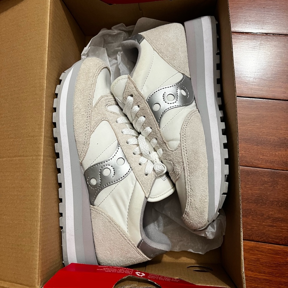 Saucony women’s Cream and Silver Sneakers